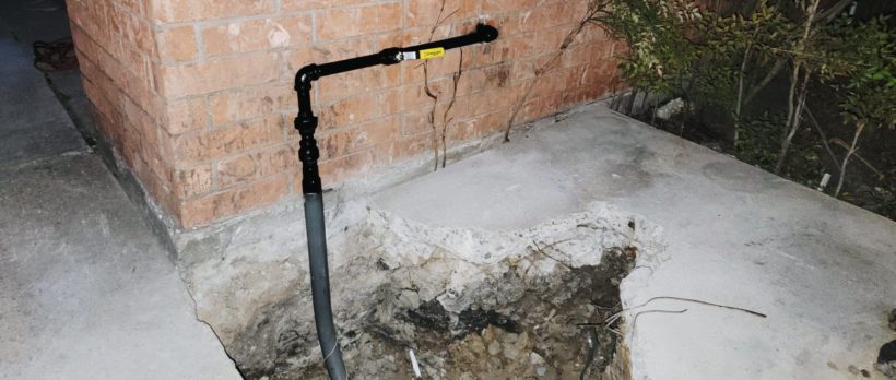 image of a gas riser installation on driveway