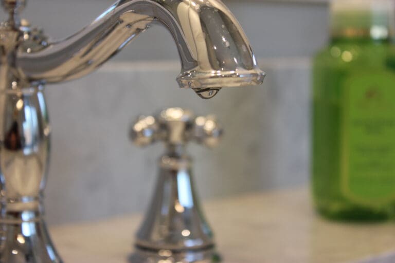 Bathroom faucet with drip of water