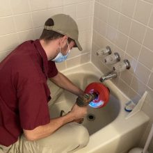 Cleaning a Tub Drain Cleaning a Tub Drain
